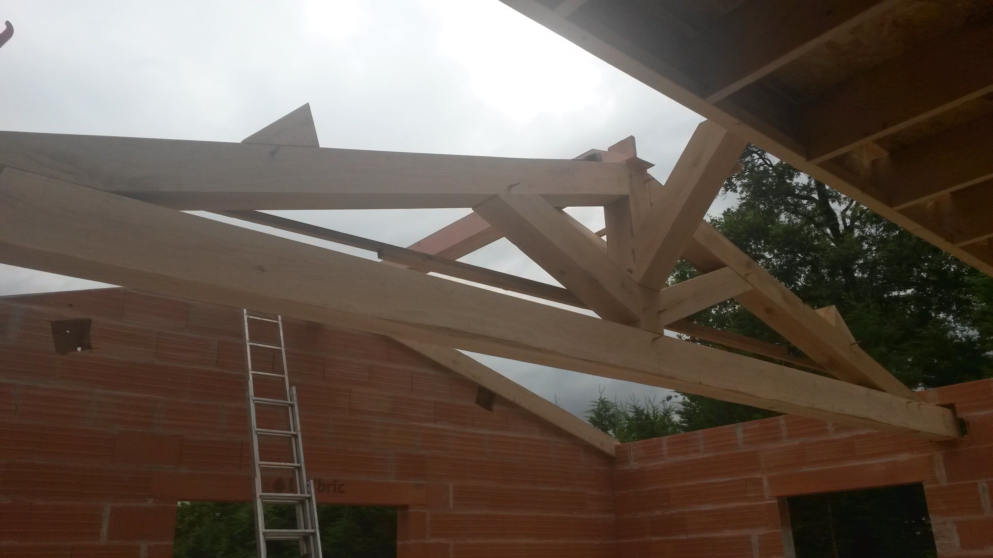 Réalisation charpente - Cœur de Travaux